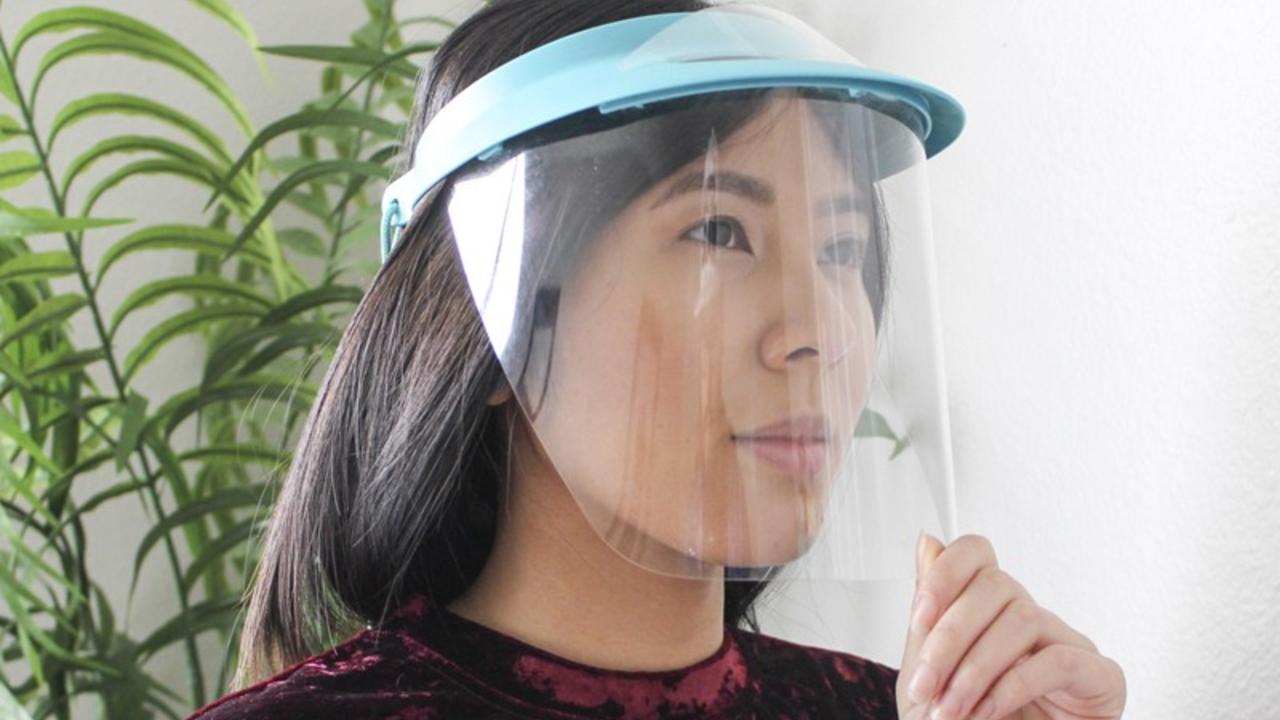 woman wearing a face shield