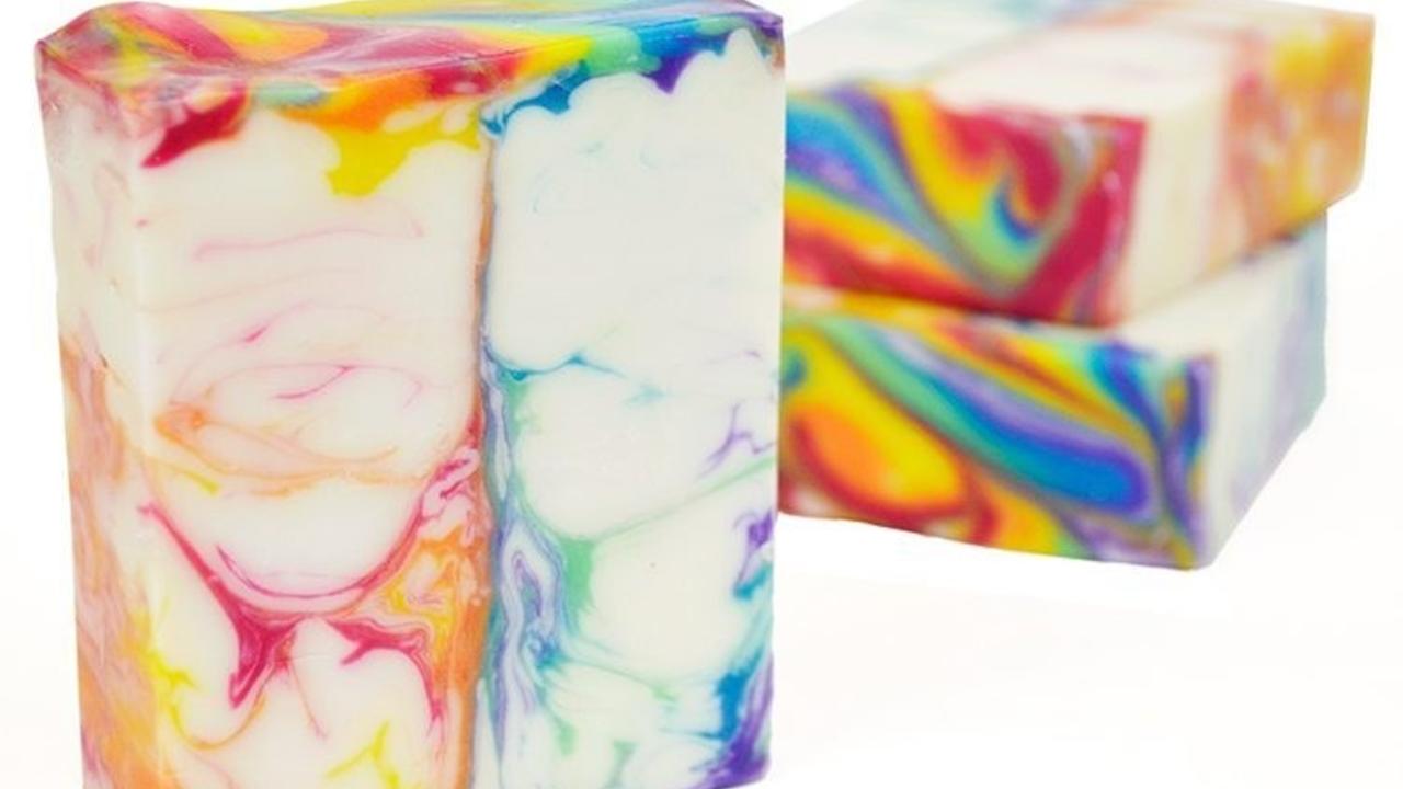 three bars of rainbow swirled soap
