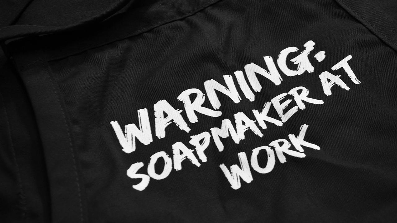 warning soapmaker at work