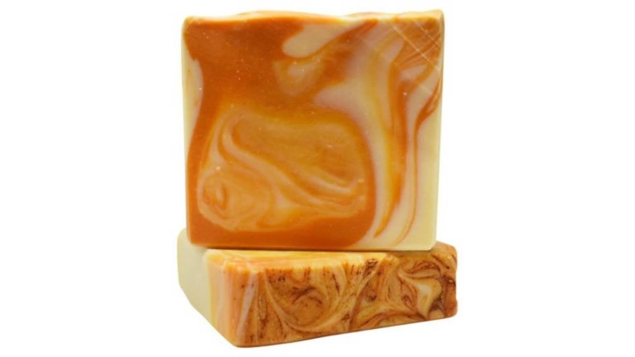 two bars of almond turmeric soap
